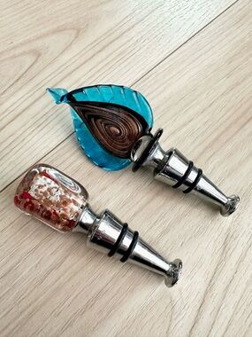 Two murano glass wine stoppers
